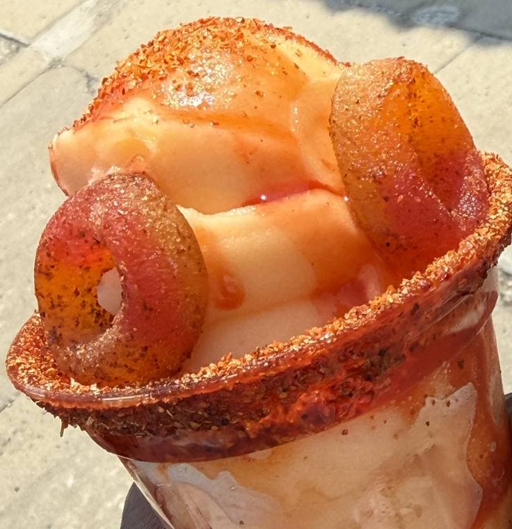 Loaded water ice with a chili-lime rim and gummy rings