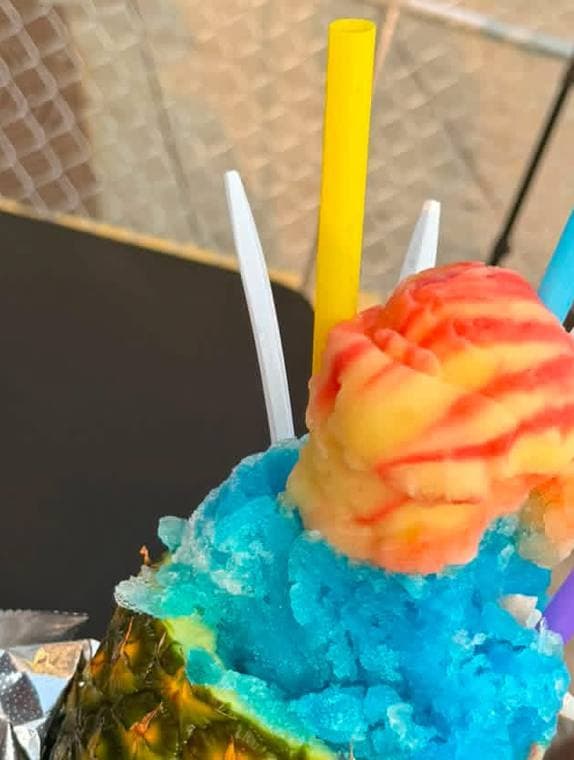 Stuffed pineapple with blue snoball and water ice