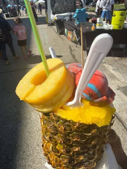 Stuffed pineapple topped with a pineapple ring